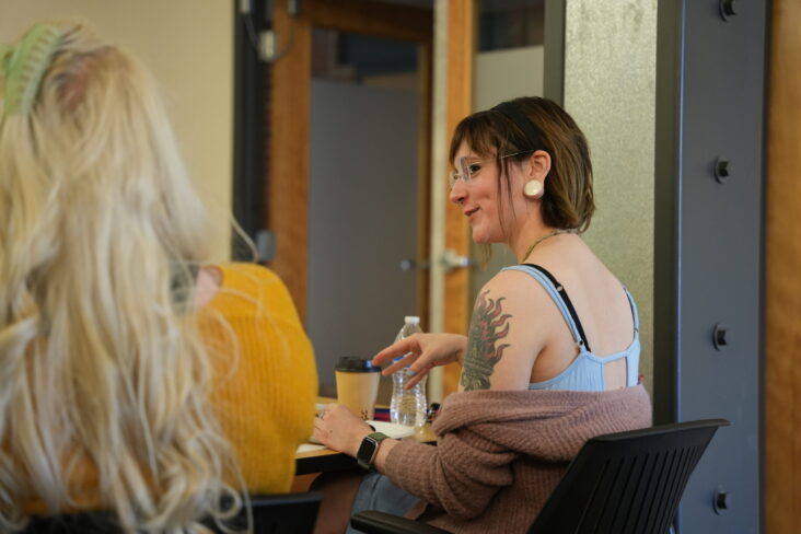 a girl talking to another girl