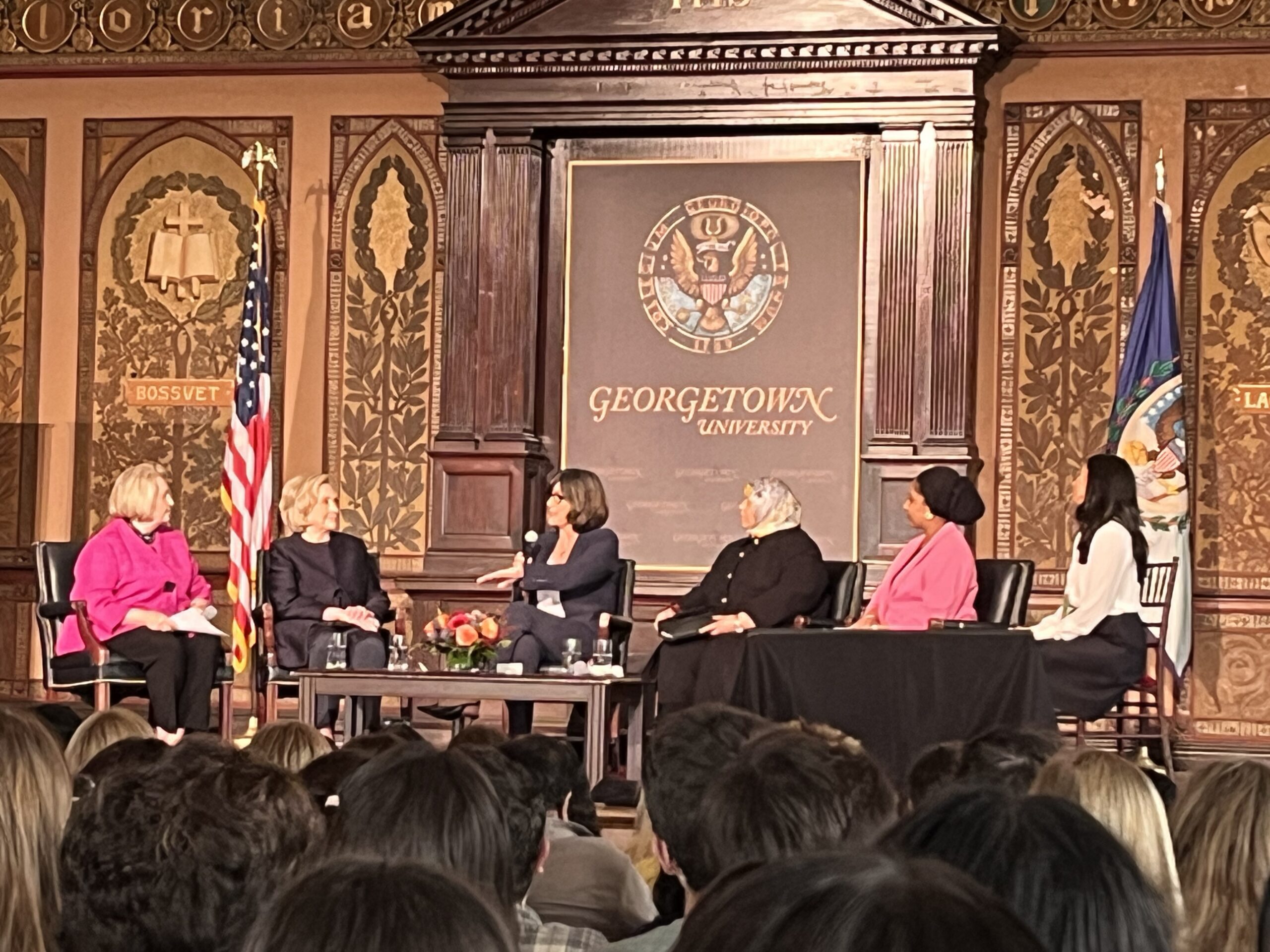 a panel of women speaking