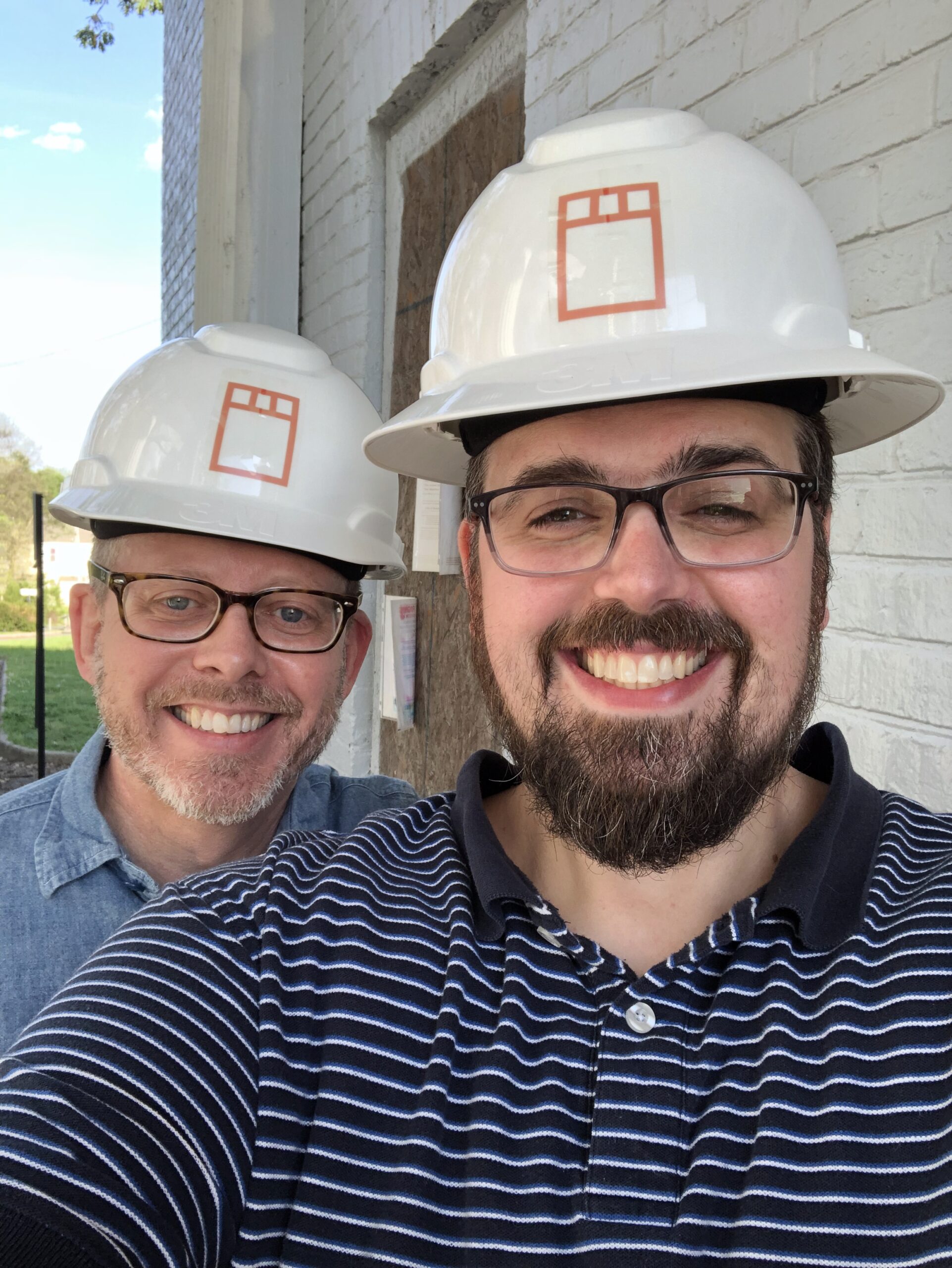two guys in hard hats
